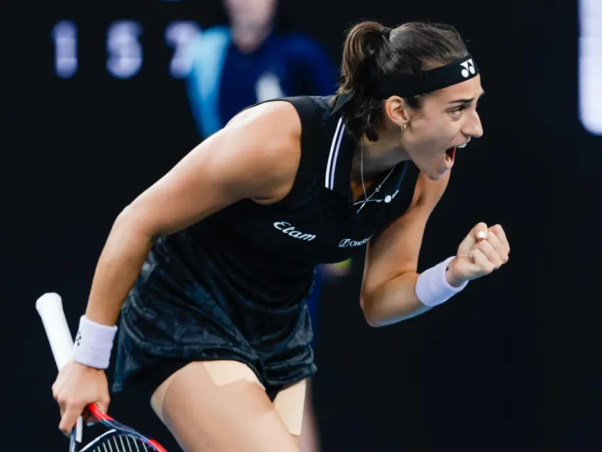 Australian Open: Caroline Garcia holds nerves at bay to enter second week