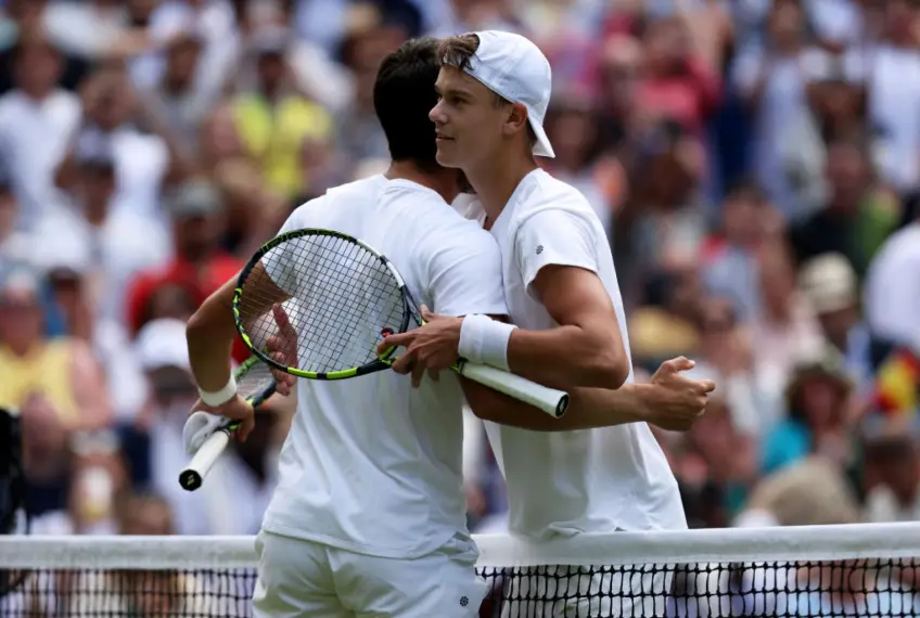 Decoding Defeat: Holger Rune Reflects on Wimbledon Loss to Carlos Alcaraz
