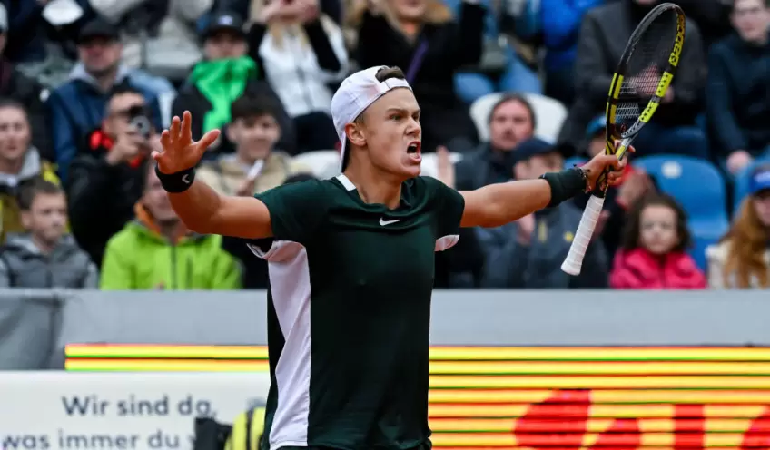 Holger Rune reacts to winning first ATP title after 'worst way possible' end to final