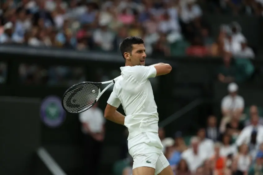 Wimbledon: Novak Djokovic eases past Stan Wawrinka