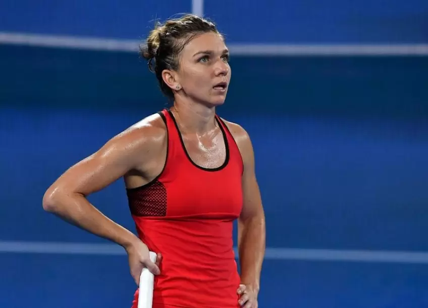 Wta Beijing: Simona Halep forced to retire to Ons Jabeur