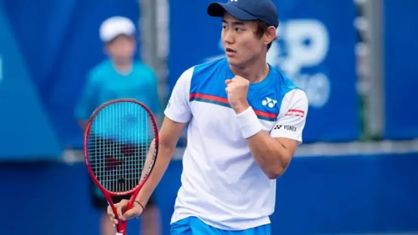 Yoshihito Nishioka reacts to beating Jo-Wilfried Tsonga at Roland Garros